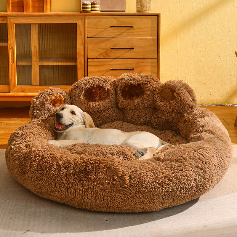 Pet resting in plush shell nest bed