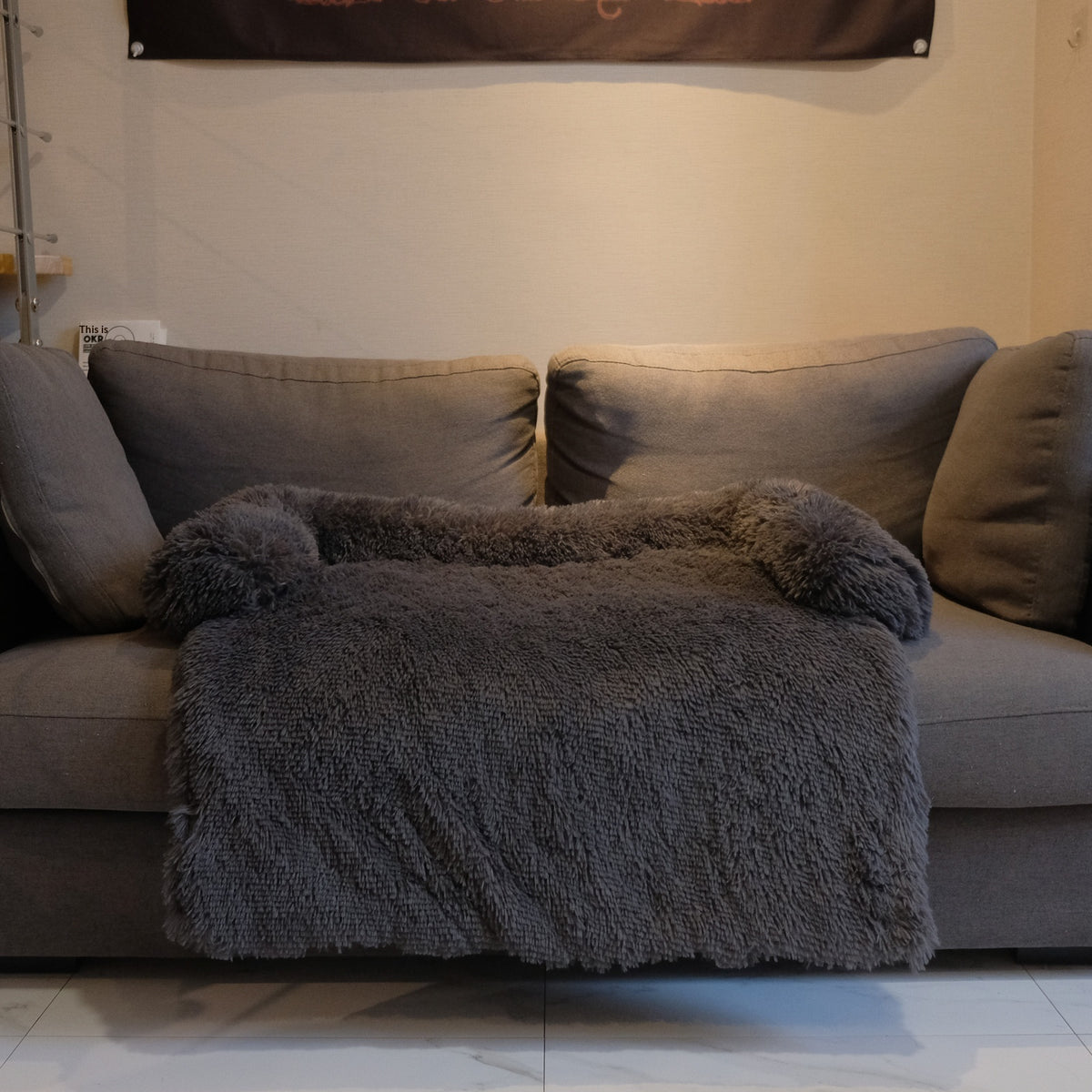 Dog resting in deep pile plush bed