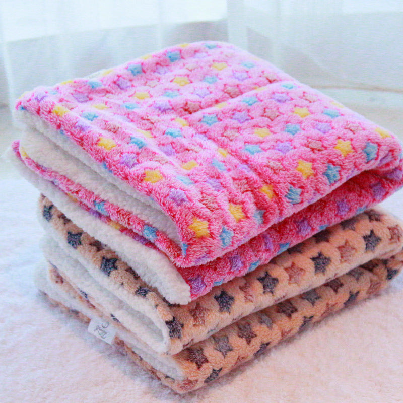 Dog resting on plush calming blanket